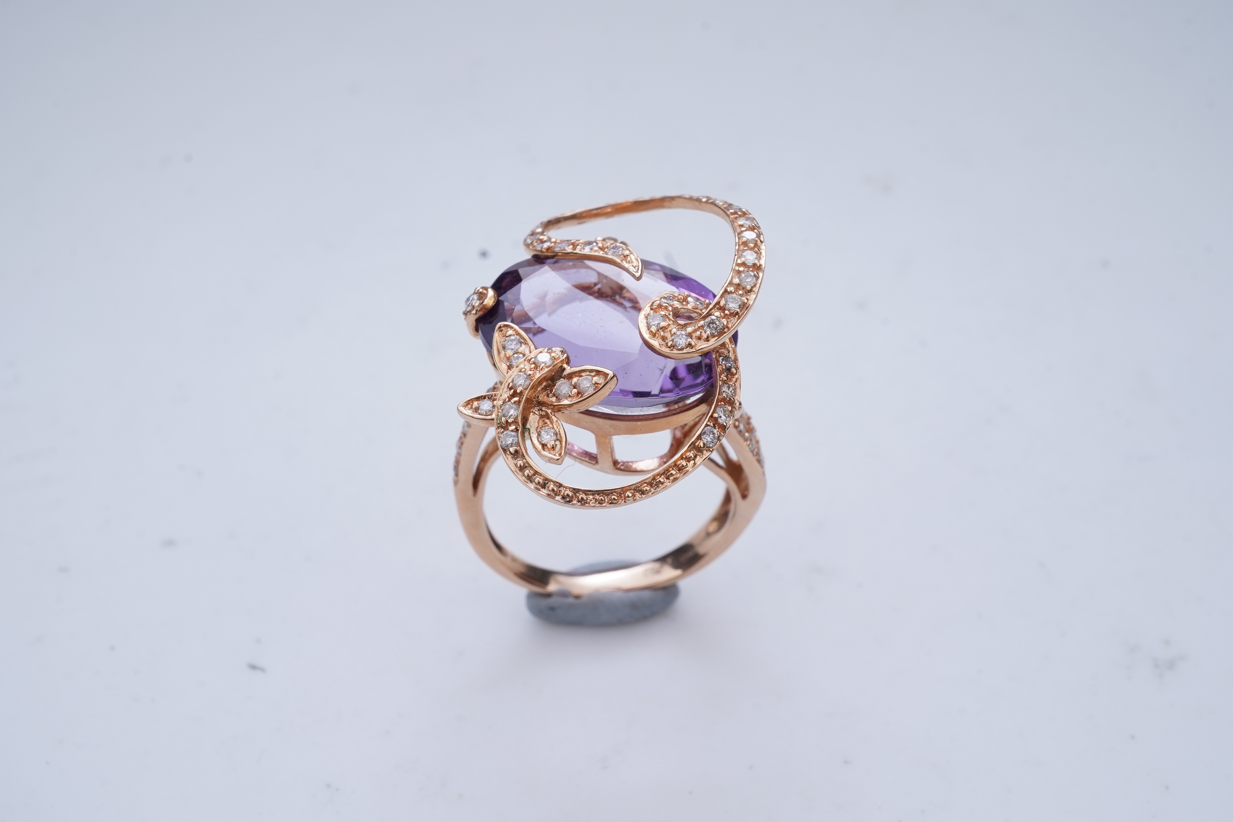 An amethyst and diamond ring
